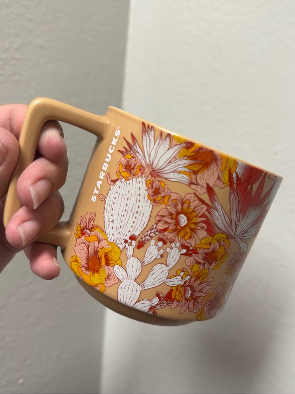 Starbucks Tan Mug with White Cactus and Yellow Floral Accents